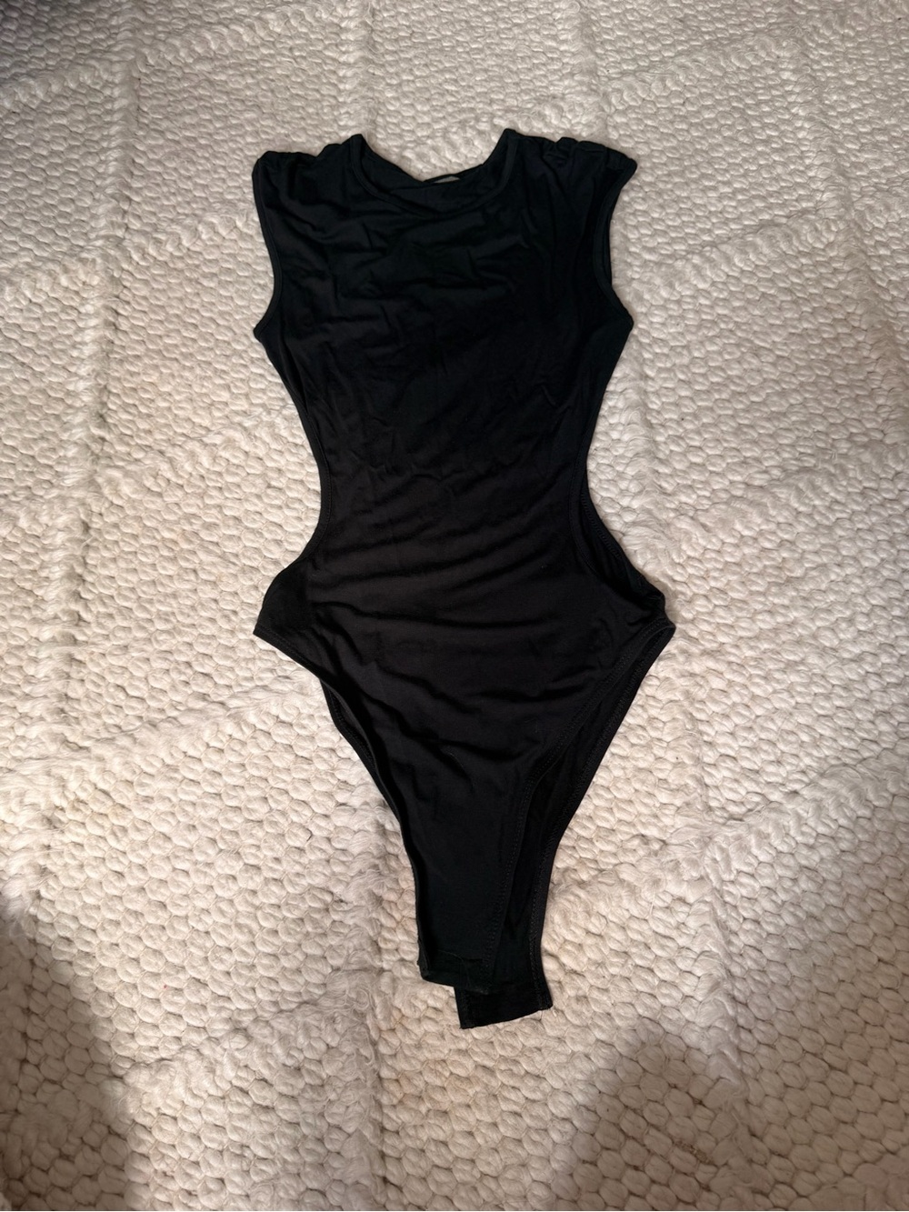 Sleek Black Cutout One-Piece Bodysuit